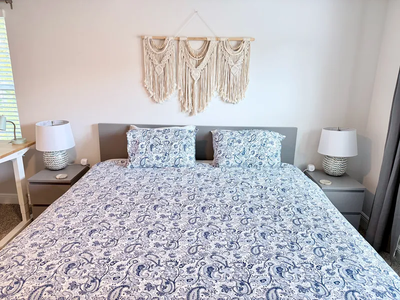 King bedroom seating and dresser in the primary suite
